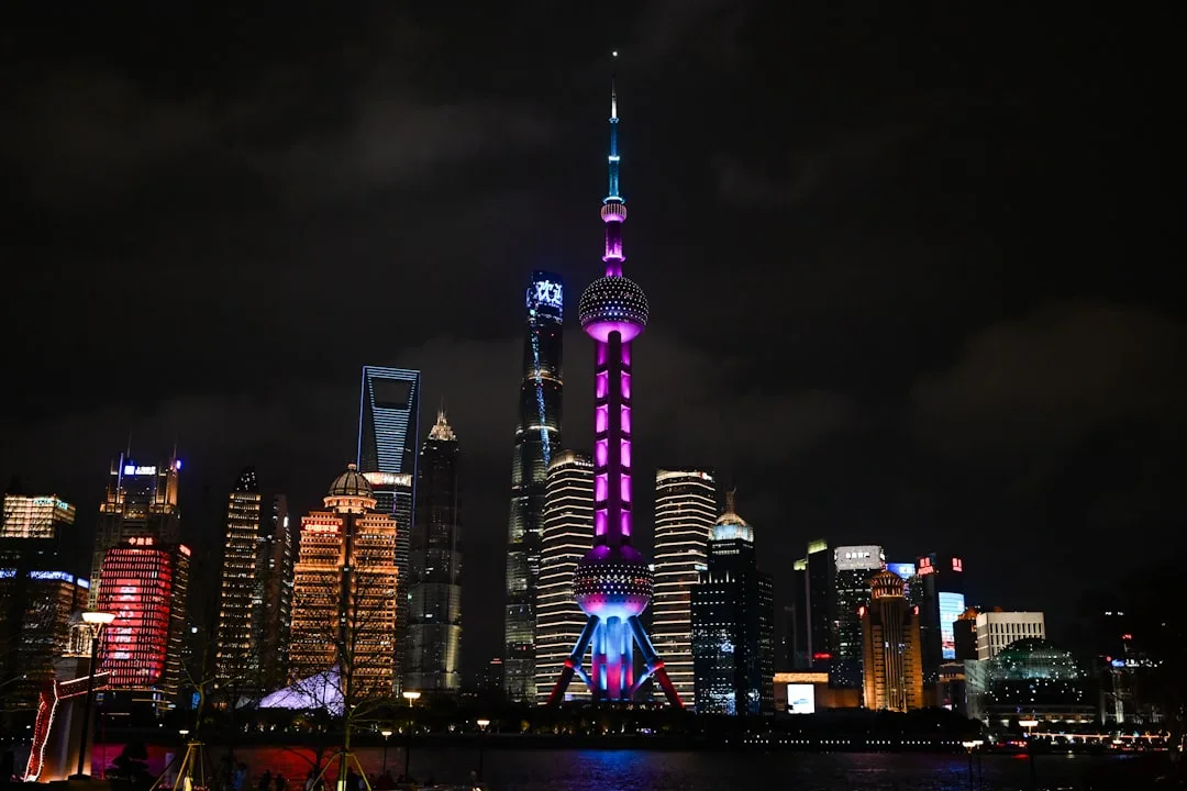 Shanghai Pudong skyline at night seen from the Bund waterfront