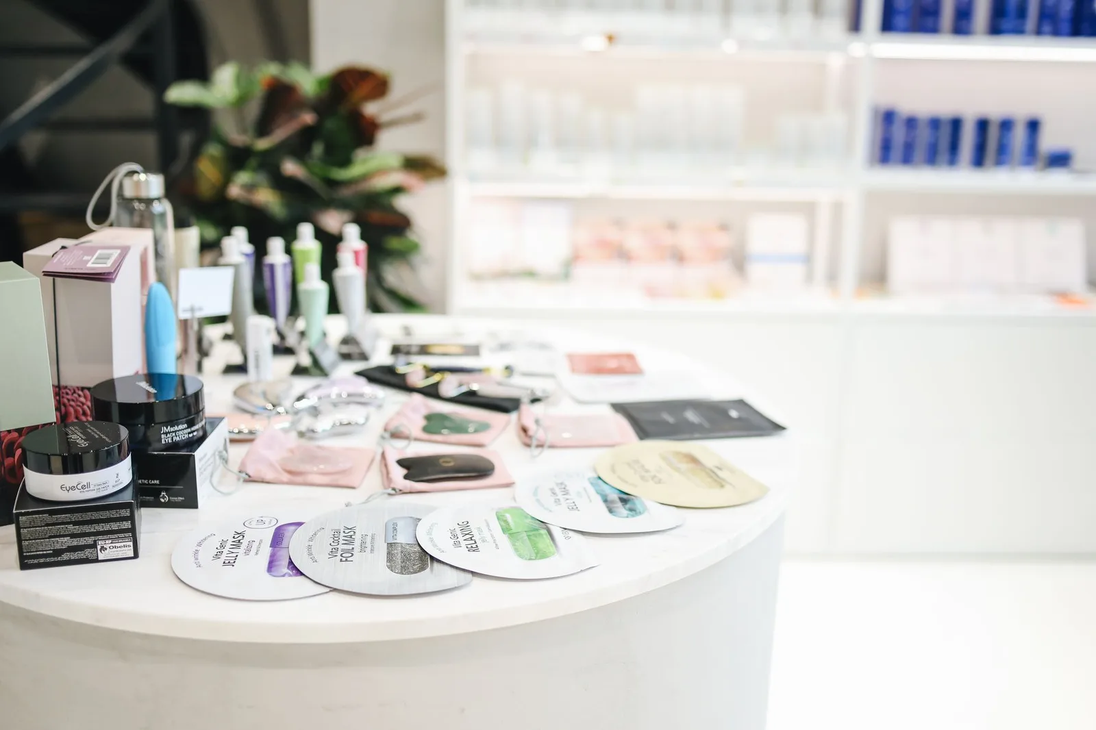 Shopper browsing Korean sheet masks and skincare at a beauty retailer